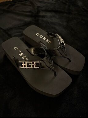 GUESS Black Platform Thong Sandals with metallic accents